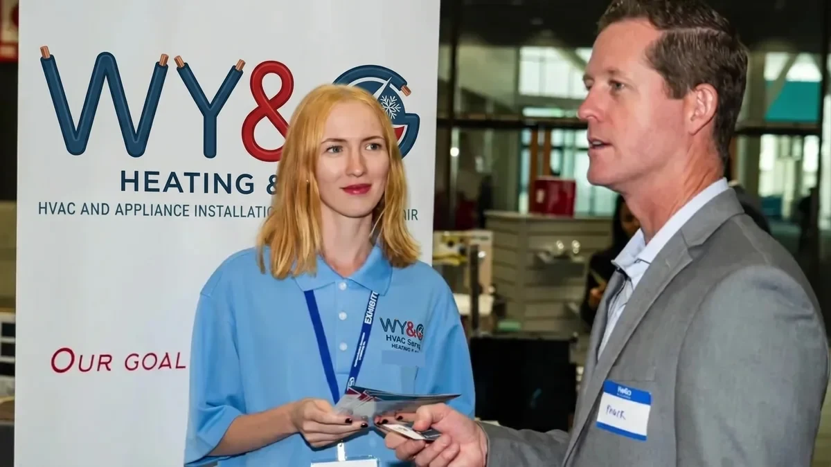 WY&G team member talking with a visitor
