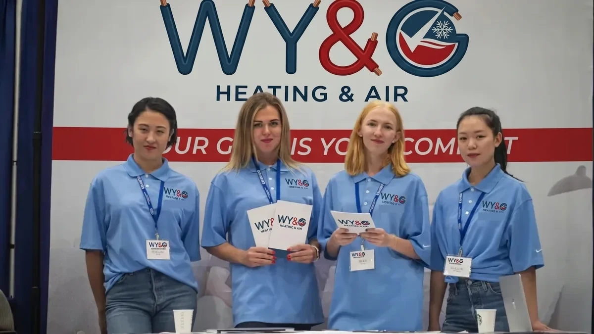 WY&G team members with brochures